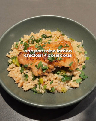 Bowl of lemon chicken over couscous.