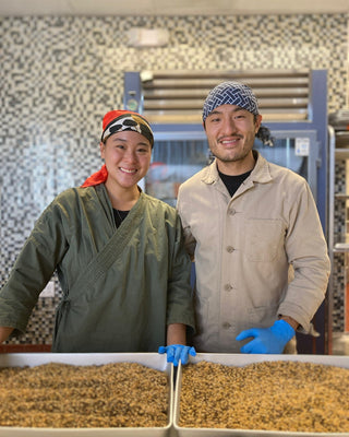 Founders Eleana and Kevin working with koji