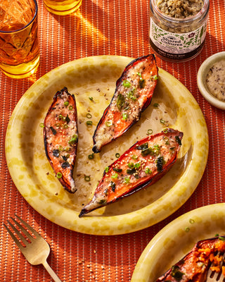 Miso glazed sweet potato on a plate and a jar of Shared Cultures Kombu Garlic Miso
